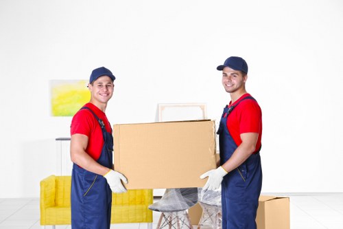 Local piano moving team handling a careful removal in a Highbury property