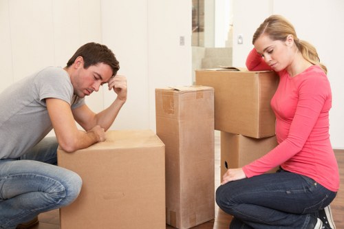 Packed boxes and furniture ready for a local home removal service