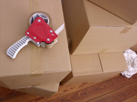 Boxes and furniture being loaded for a house move in Highbury