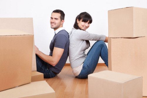 Packed moving boxes and furniture ready for a Highbury home or flat removal