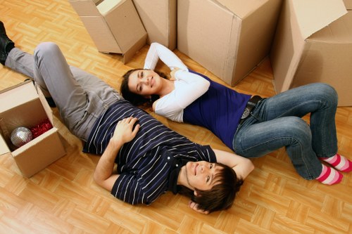 Assorted cardboard boxes and wrapping materials for a local move in Highbury