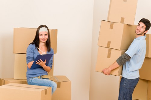 Office furniture and equipment being loaded for a commercial move